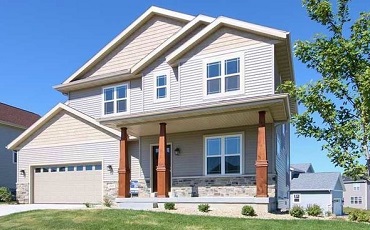 The front of a custom built home by Trademark Homes.